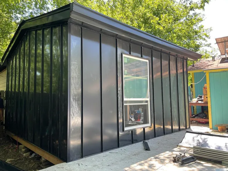 Black standing seam metal wall panels for Roof Inspection in Blaine